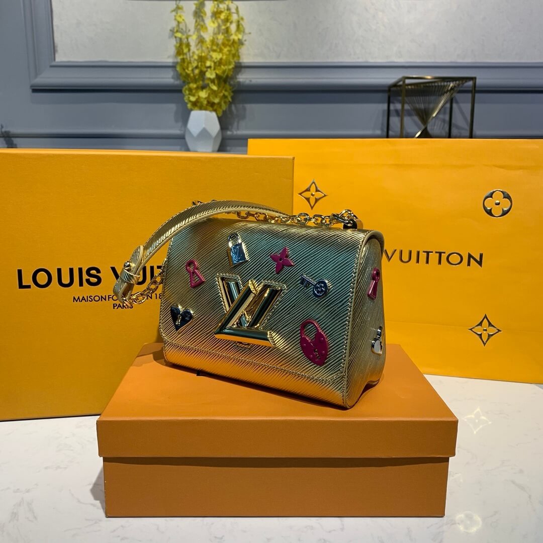 3c8797ca248b2aceb979aae4a1528cfa80bb3f21 Louis Vuitton Epi Leather Twist PM M50332 Gold - Image 1
